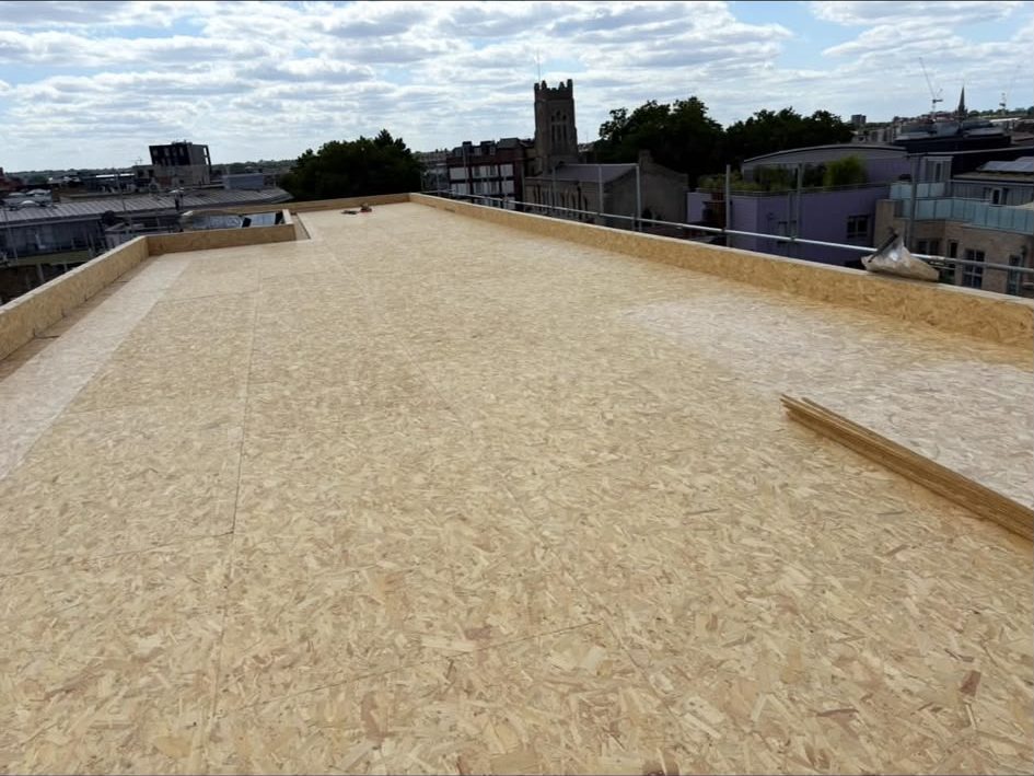 Roof deck boarded and ready for its covering