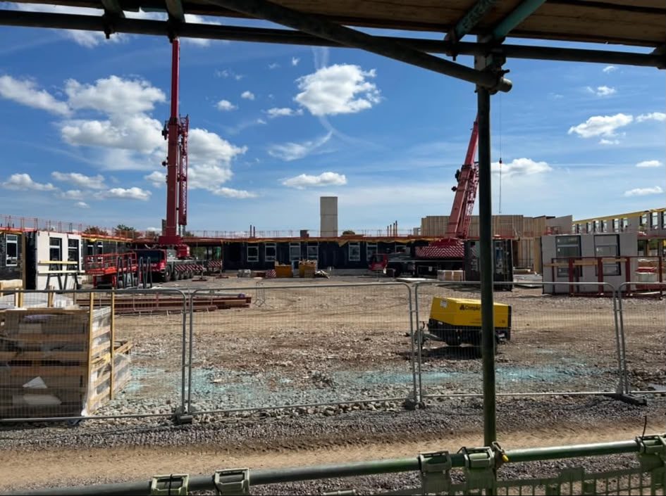 Cranes set up on a live development, Spencer Frames & Structures project work near Yateley Common, Yateley GU46