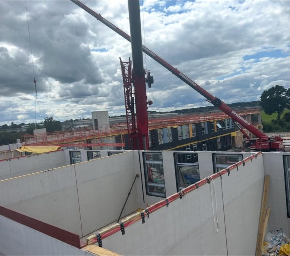 Wall panels craned into position