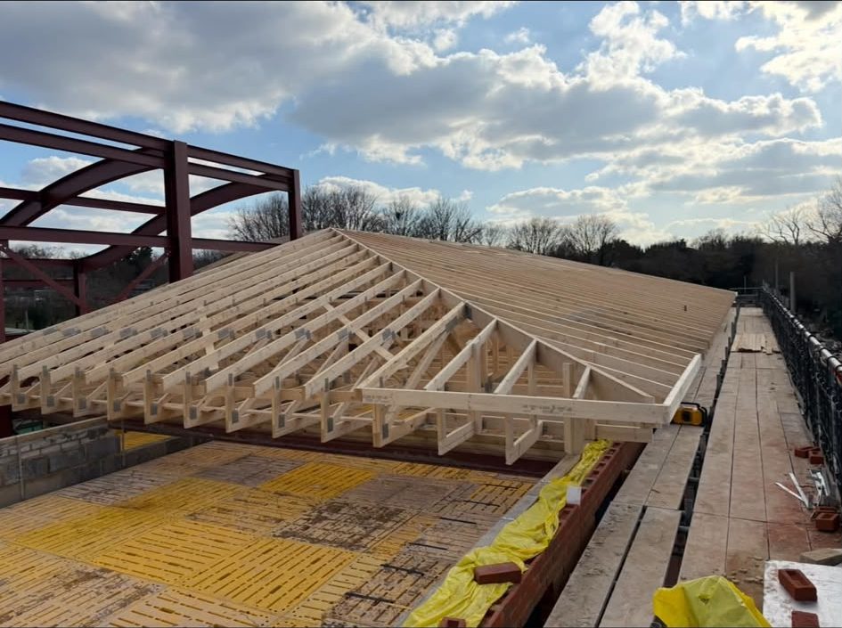 Hipped truss roof landed on a structural steel frame, Spencer Frames & Structures project work near Victoria Square, Woking GU21