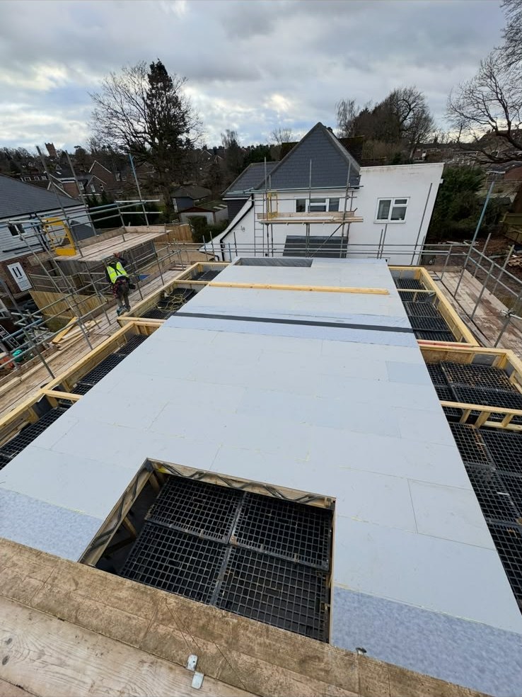 Insulated floor deck on a timber frame
